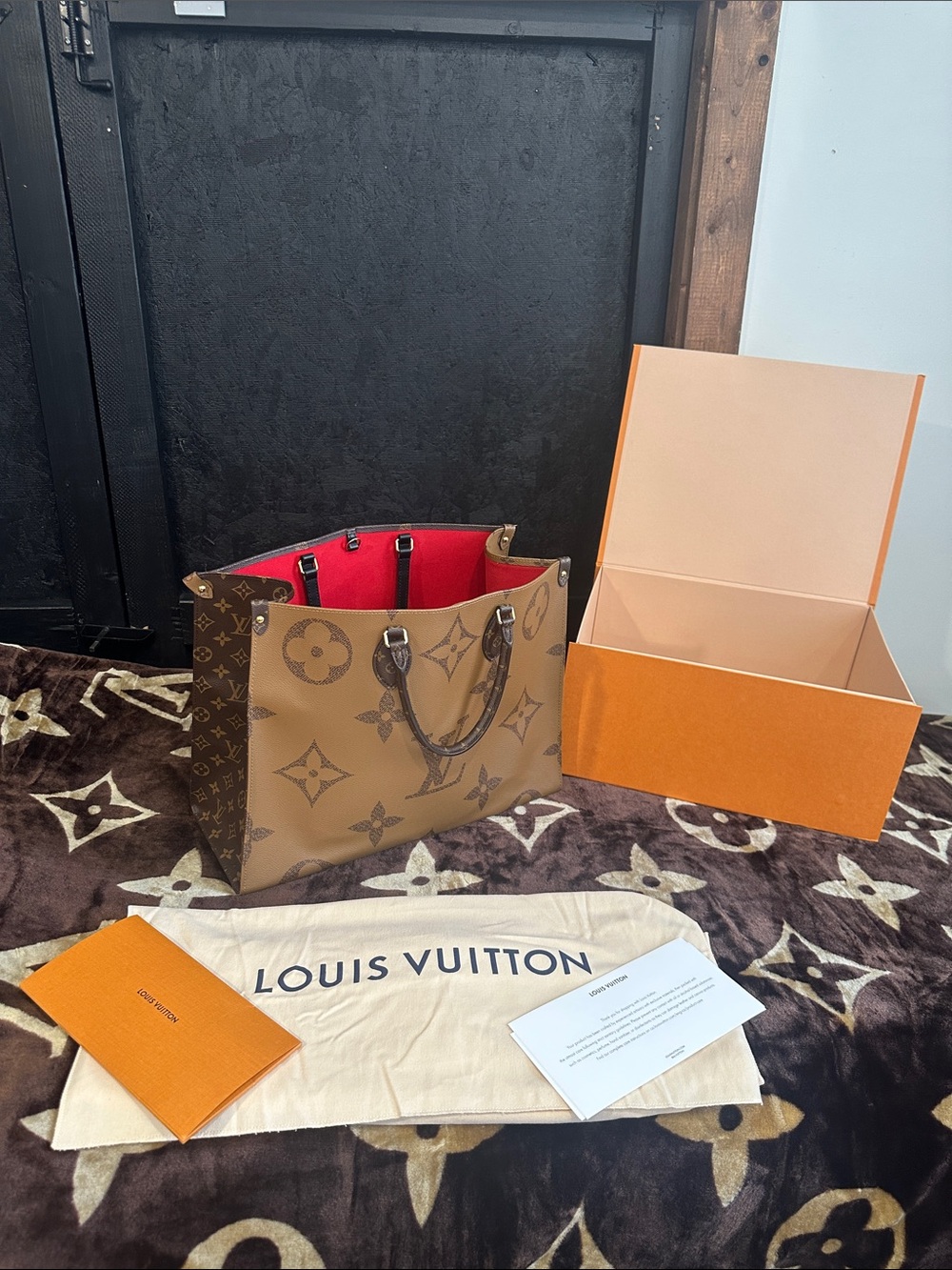Louis Vuitton Monogram Reverse OnTheGo Tote in Brown with Red Interior